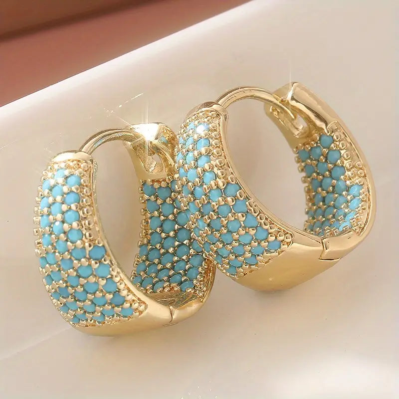 Gold-coloured hoop earrings with turquoise pearls | Gold