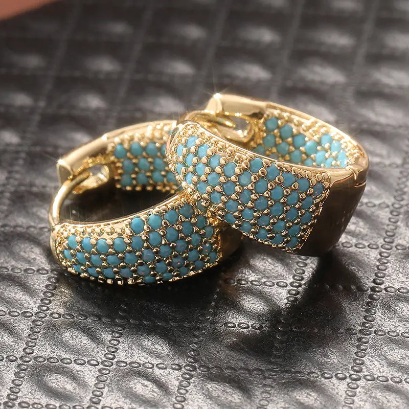 Gold-coloured hoop earrings with turquoise pearls | Gold