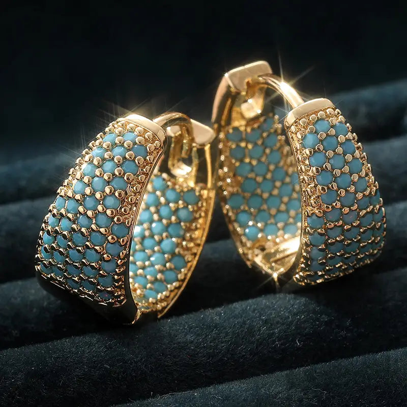 Gold-coloured hoop earrings with turquoise pearls | Gold